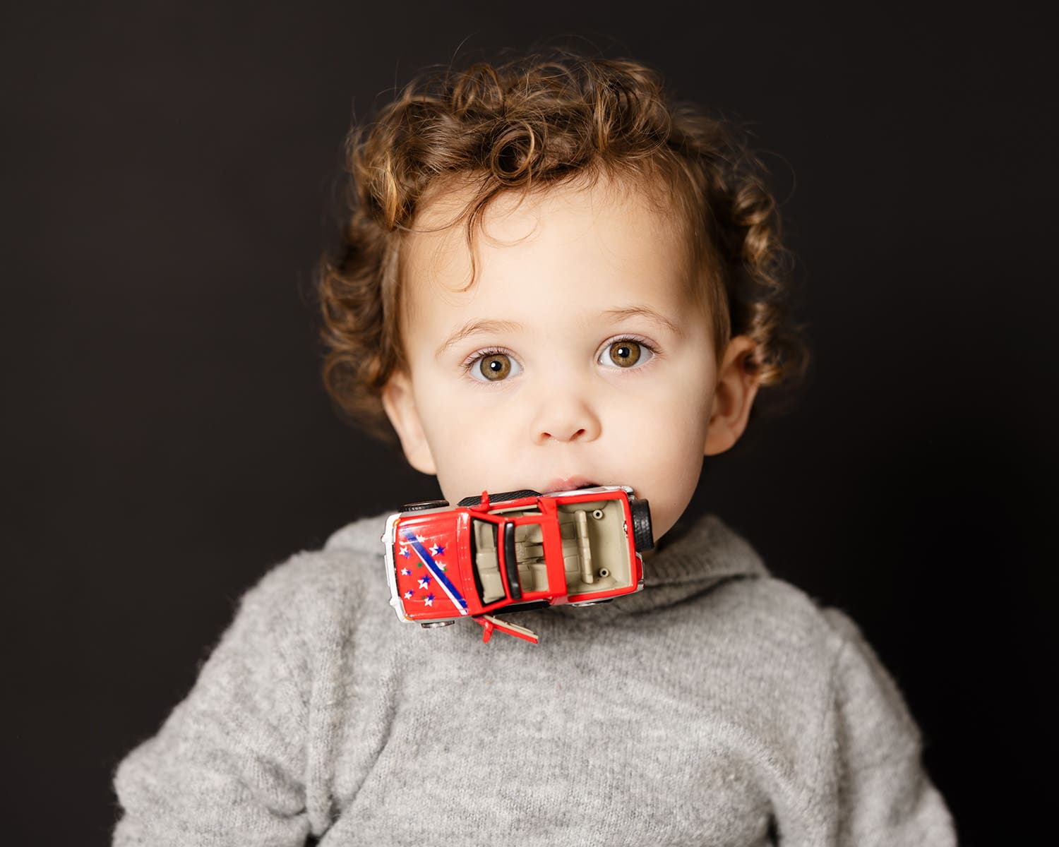 Fine art school portrait on black background in Norfolk